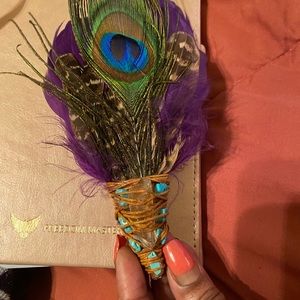 Peacock feather smudge fan